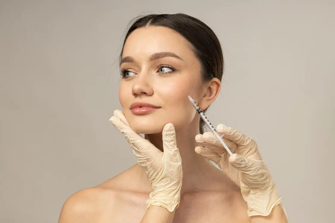 A person getting botox injection

AI-generated content may be incorrect.
