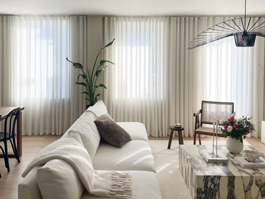 Custom-made sheer in S-fold style is perfect for this living room
